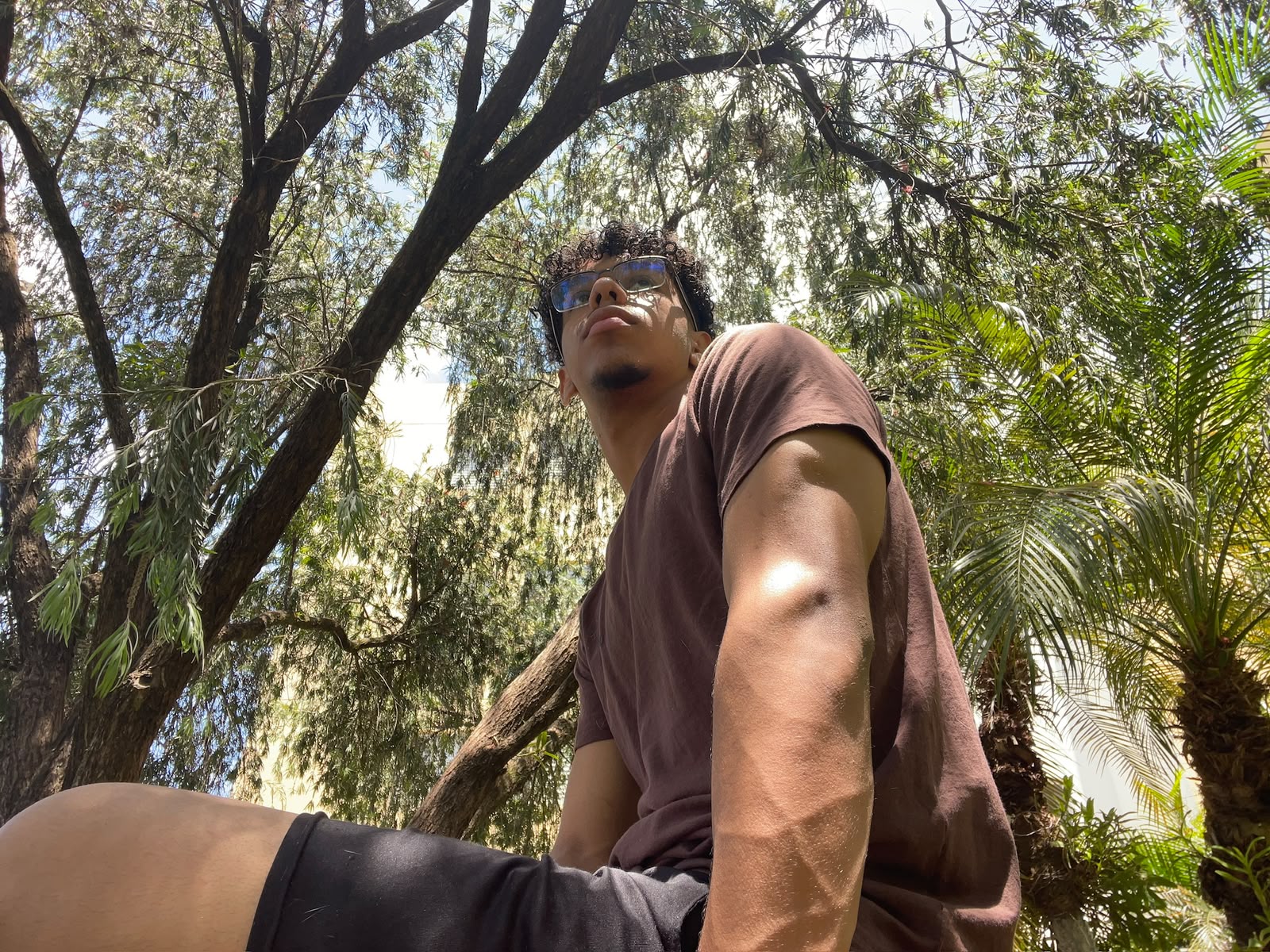 Daniel Ricardo outdoors wearing glasses